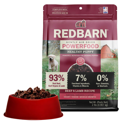 Redbarn Gently Air Dried Powerfood Healthy Puppy Beef & Lamb Recipe with a bowl of the Air Dried Food on a white background