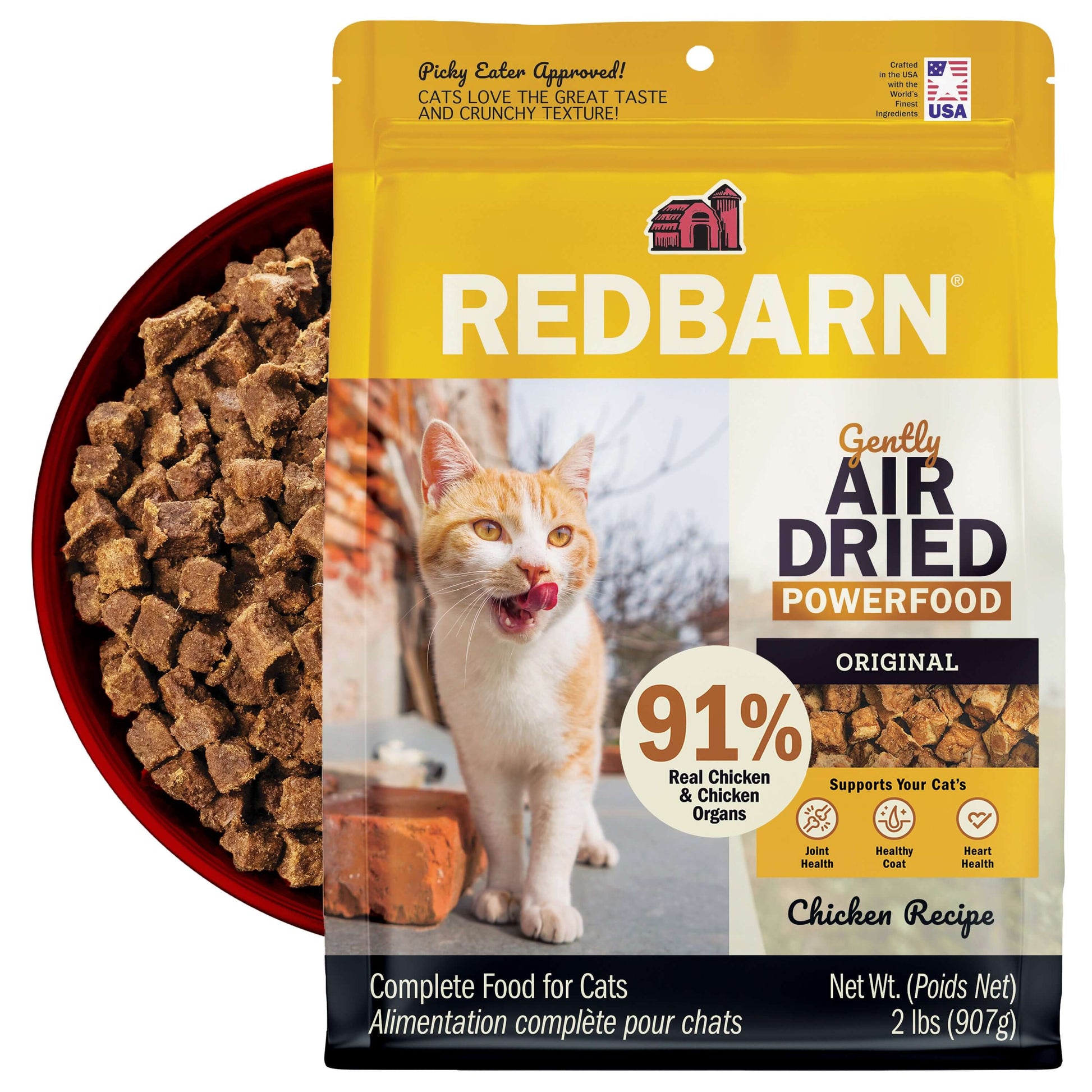 Redbarn Gently Air Dried Powerfood Chicken Recipe Cat food package with a bowl of the Air Dried Food in the back on a white background