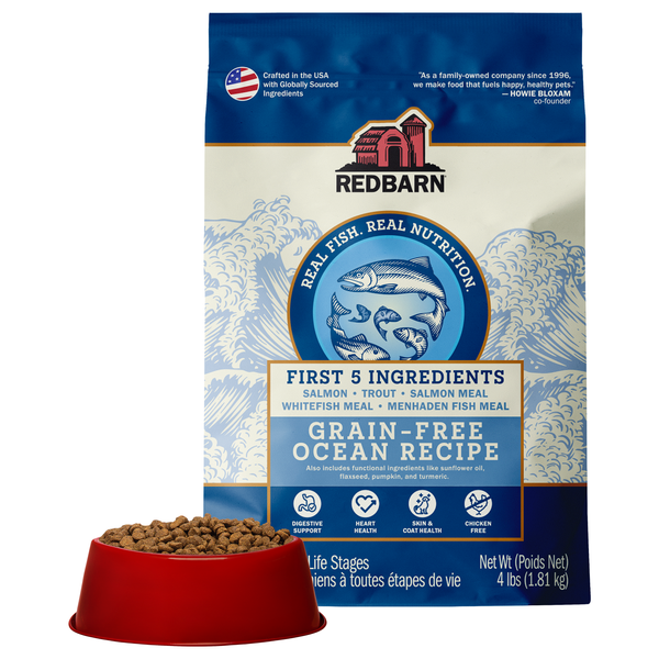 Best Fish Food for dogs. Redbarn Grain-Free Ocean recipe dog food package featuring Salmon, Trout, Salmon Meal, Whitefish Meal, Menhaden Fish Meal.
