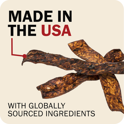 Redbarn Bully Slice Treat with 'Made in the USA' and 'globally sourced ingredients' text on a beige background