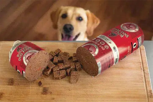 A dog eagerly waiting for the Redbarn Beef Recipe Rolled Food